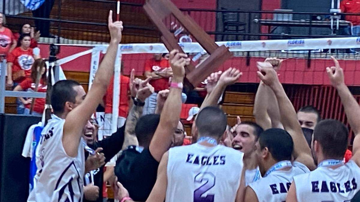 Southwest players celebrate holding the state championship trophy after beating Cardinal Gibbons in four games in the state final on Saturday night at Polk State College in Winter Haven, Fla.