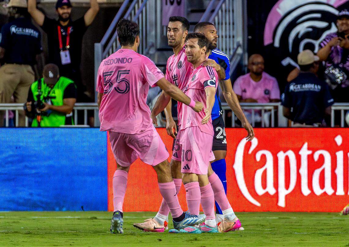 Inter Miami forward Lionel Messi (10) celebrates with teammates Sergio Busquets (5) and Federico Redondo (55) after scoring during the first half of an MLS match against CF Montréal at Chase Stadium on Wednesday, May 28, 2025, in Fort Lauderdale, Fla.
