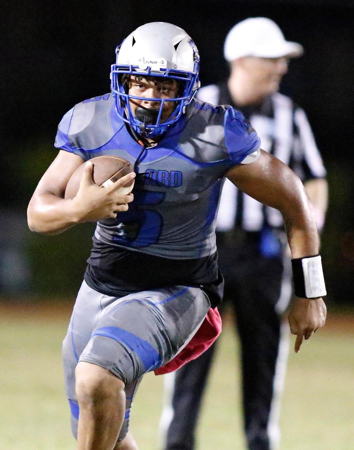 Dillard Panthers quarterback Nylan Maine (5) runs the ball against Plantation Colonels during the football game on Friday, October 13, 2023 in Fort Lauderdale.
