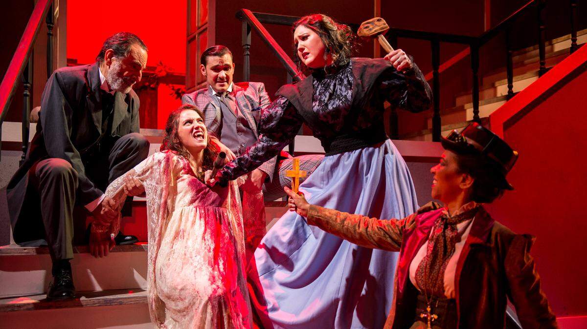 David Kwiat, DanielCapote, Lindsey Corey and Karen Stephens surround and get ready to take out Isabella Lopez in the Zoetic Stage world premiere of Michael McKeever’s “Dracula.”