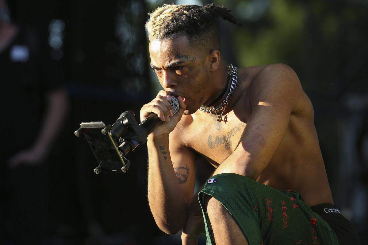 XXXTentacion performs during the second day of the Rolling Loud Festival in downtown Miami on Saturday, May 6, 2017. He was shot and killed on June 18 in the parking lot of Riva Motorsports in Deerfield Beach.