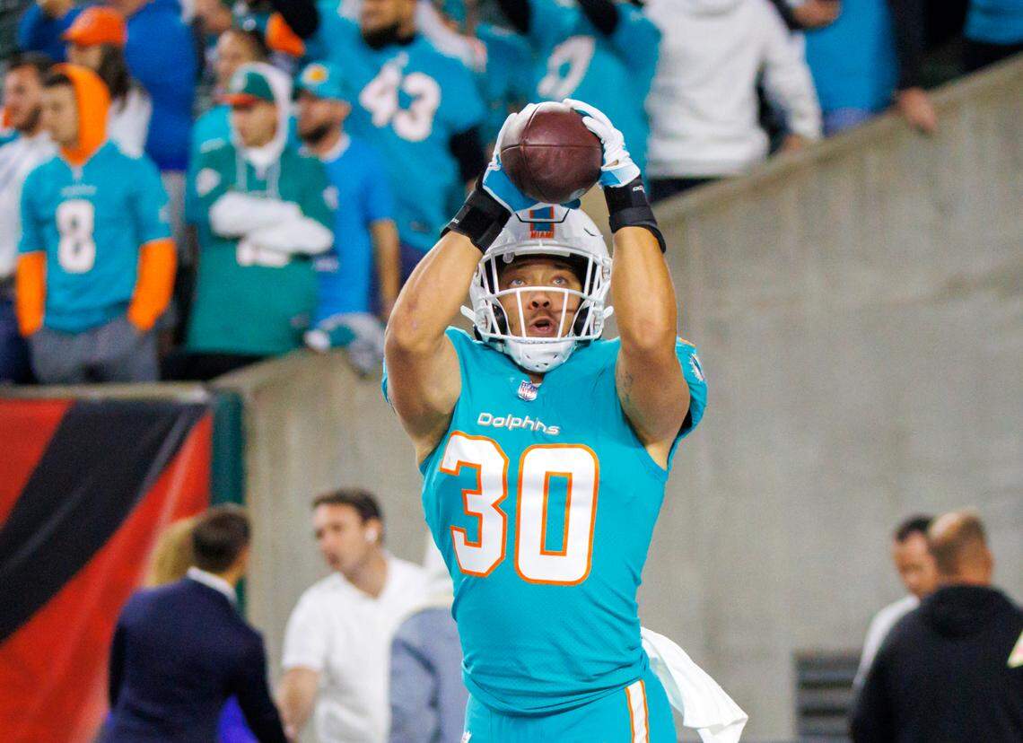 Miami Dolphins fullback Alec Ingold (30) catches a pass during pregame warmups before the start of an NFL football game against the Cincinnati Bengals at Paycor Stadium on Thursday, September 29, 2022 in Cincinnati, Ohio.