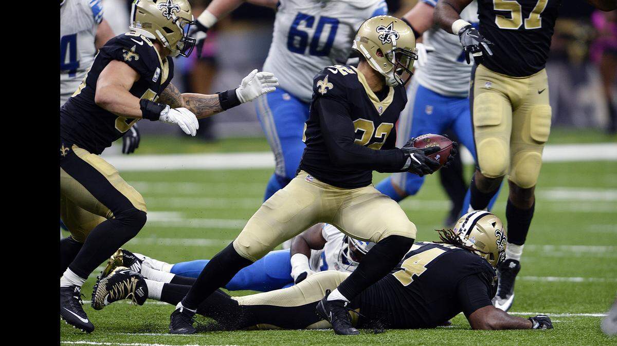 In this Oct. 15, 2017, file photo, New Orleans Saints strong safety Kenny Vaccaro (32) intercepts a pass during the second half of an NFL football game against the Detroit Lions in New Orleans.