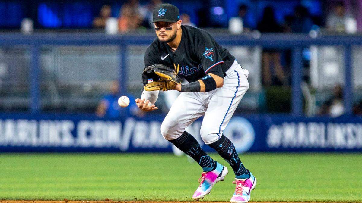 Miami Marlins shortstop Miguel Rojas (11) catches the ground ball during the first inning of an MLB game against the New York Mets at loanDepot park in the Little Havana neighborhood of Miami, Florida, on Friday, September 9, 2022.
