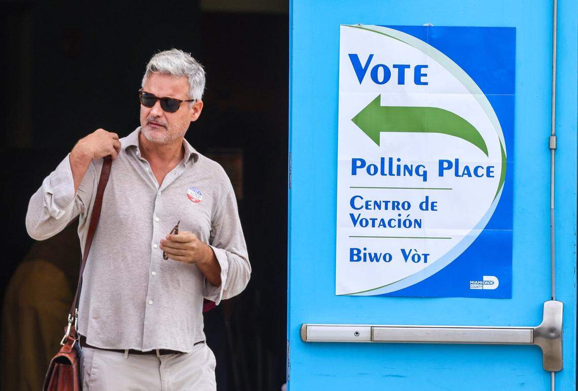 A voter exits the polling station on Election Day at the Little Haiti Cultural Complex’s Caribbean Marketplace in Miami’s Little Haiti neighborhood on Tuesday, November 5, 2024.