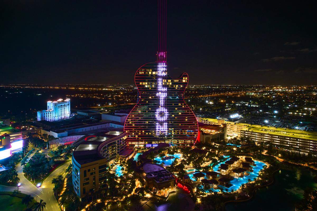 The Hard Rock Live at Seminole’s “Guitar Hotel” illuminates with the logo of Elton John to celebrate the legend’s intimate one-off concert at the venue scheduled for Feb. 27, 2022.