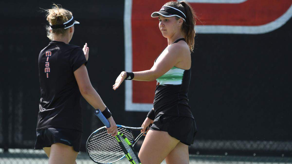 Dominika Paterova and Ulyana Shirokova as the Miami Hurricanes women's tennis team plays North Carolina State in March.