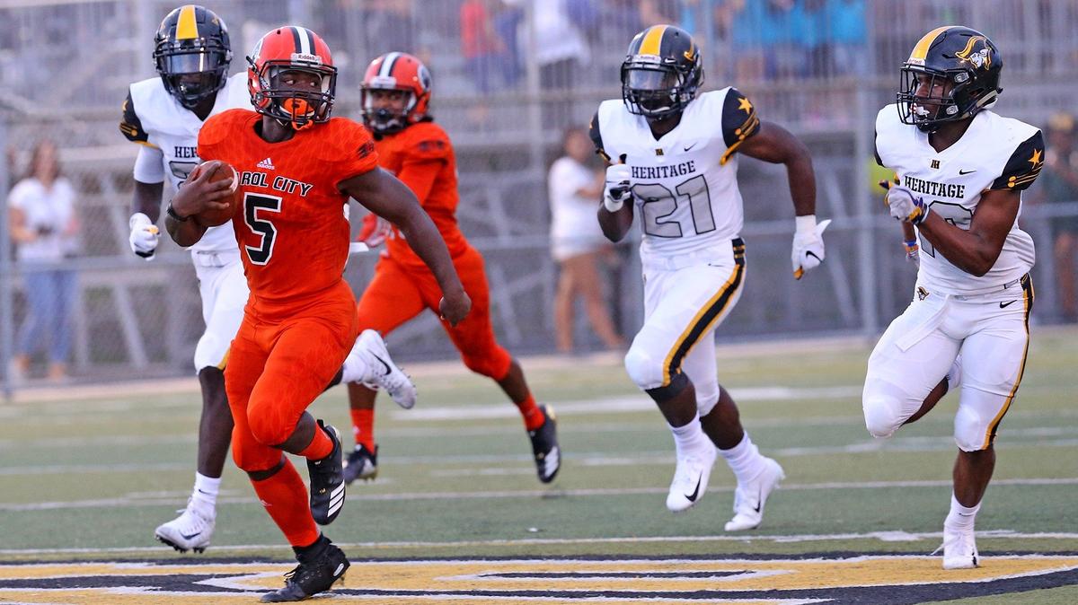 Miami Carol City’s Nay’Quan Wright runs for an early touchdown in the first quarter as they play American Heritage HS at American Heritage HS in Plantation, Florida, August 24, 2018.