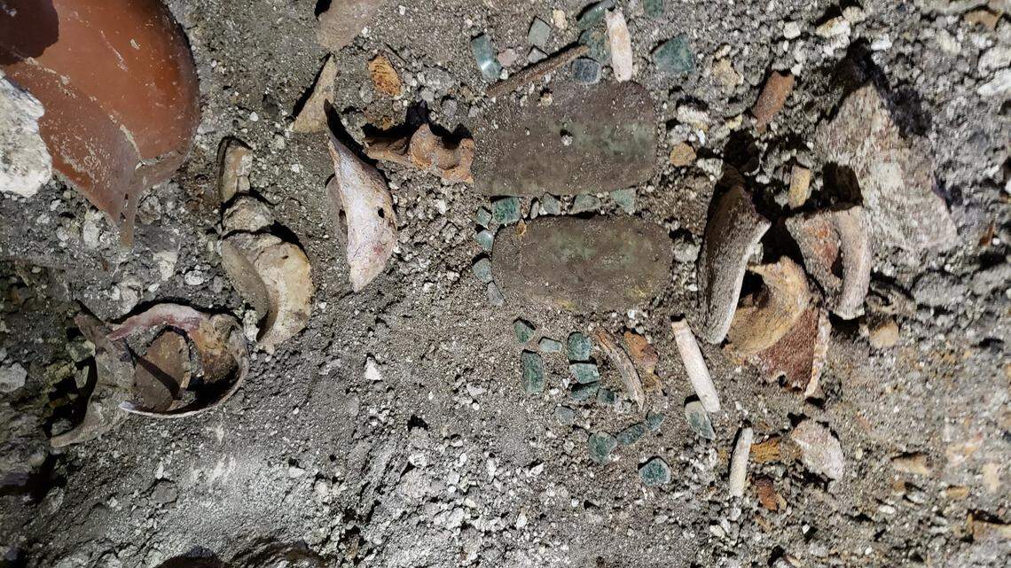 Underground tunnels dug by looters barely stopped just feet from the burial, according to archaeologists.