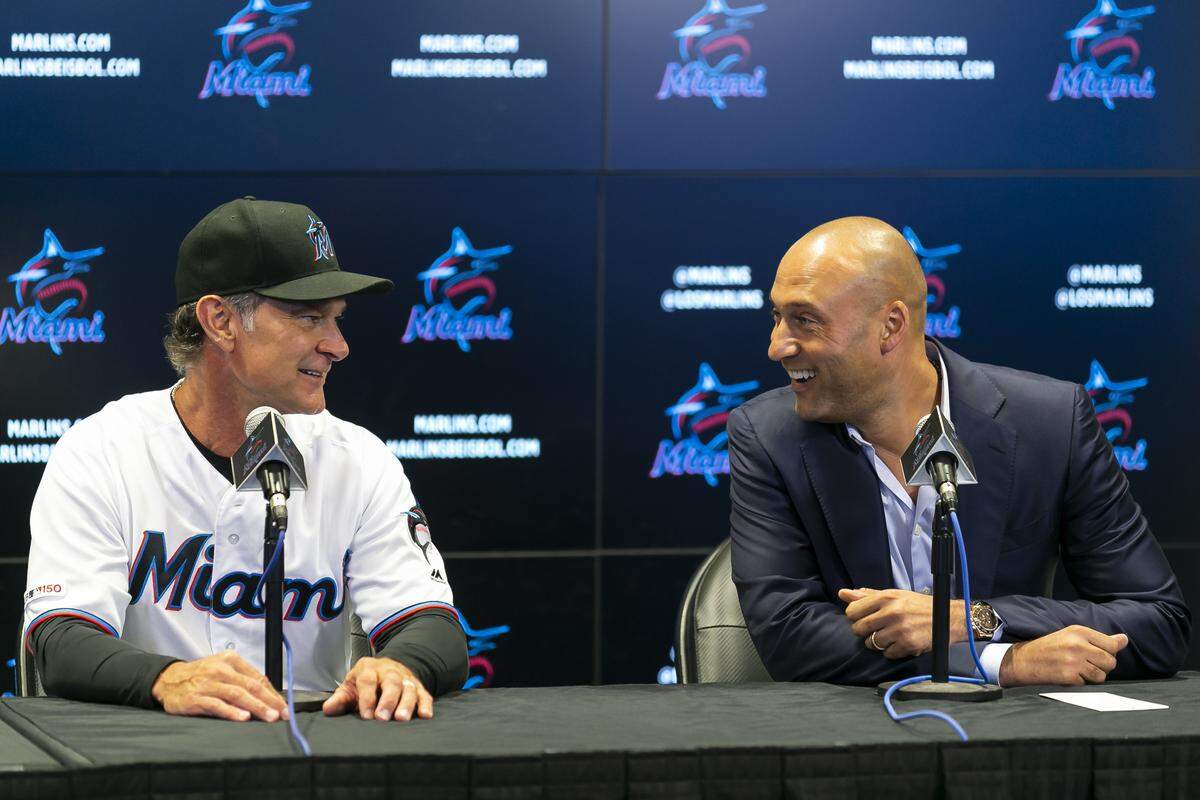 Don Mattingly, Miami Marlins team manager, left, and Derek Jeter, chief executive officer, speak during a press conference at Marlins Park in Little Havana on Friday, September 20, 2019. The Miami Marlins announced they resigned Don Mattingly and Miguel Rojas to a two-year contract extension with the team.