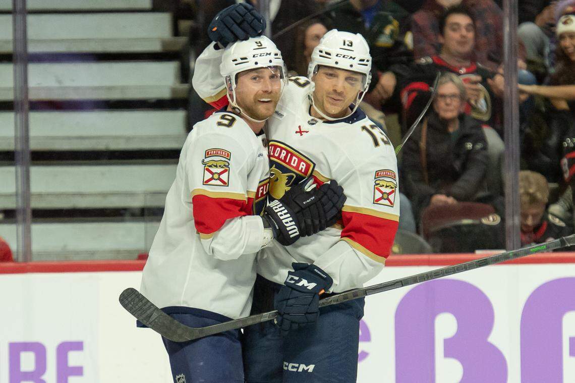 Nov 27, 2023; Ottawa, Ontario, CAN; Florida Panthers center Sam Bennett (9) celebrates with center Sam Reinhart (13) his goal scored in the second period against the Ottawa Senators at the Canadian Tire Centre.