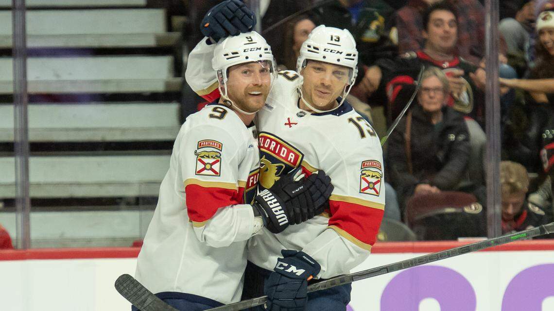 Nov 27, 2023; Ottawa, Ontario, CAN; Florida Panthers center Sam Bennett (9) celebrates with center Sam Reinhart (13) his goal scored in the second period against the Ottawa Senators at the Canadian Tire Centre. Mandatory Credit: Marc DesRosiers-USA TODAY Sports