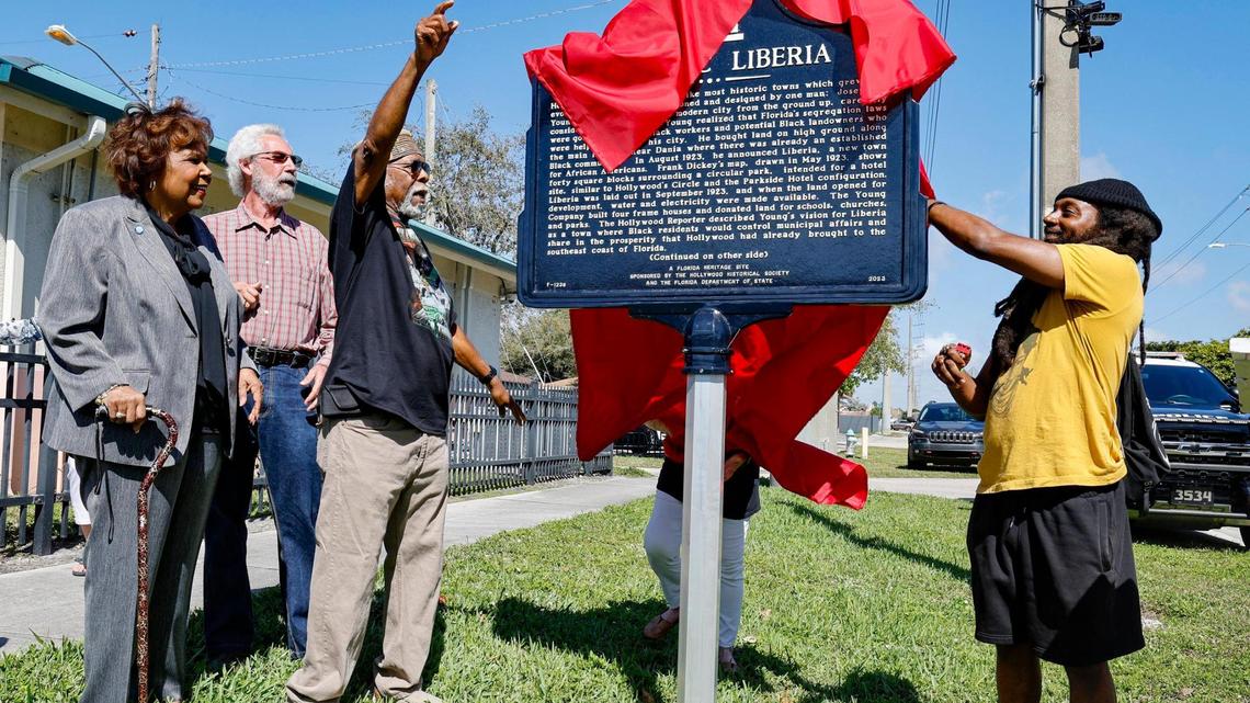 Liberia, a historically Black community in Hollywood, Florida, received a state historical marker to commemorate Liberia’s history on Saturday, Feb. 15, 2025. Unveiling the marker is Earl Beneby, left, and Emmanuel George, right.