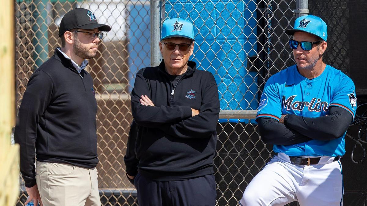 Miami Marlins president of baseball operations Peter Bendix, owner Bruce Sherman, and manager Clayton McCullough observe practice during the team’s first full-squad spring training workout at Roger Dean Stadium in Jupiter, FL, on Monday, Feb. 17, 2025.