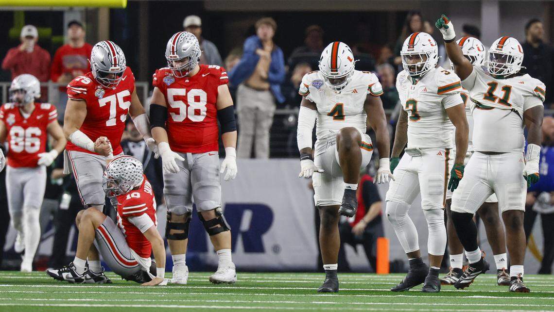 Miami Hurricanes defensive lineman Rueben Bain Jr. (4) reacts after sacking Ohio State Buckeyes quarterback Julian Sayin (10) during the first half of the College Football Playoff quarterfinal game in the Cotton Bowl at AT&T Stadium in Arlington, Texas on Wednesday, December 31, 2025.