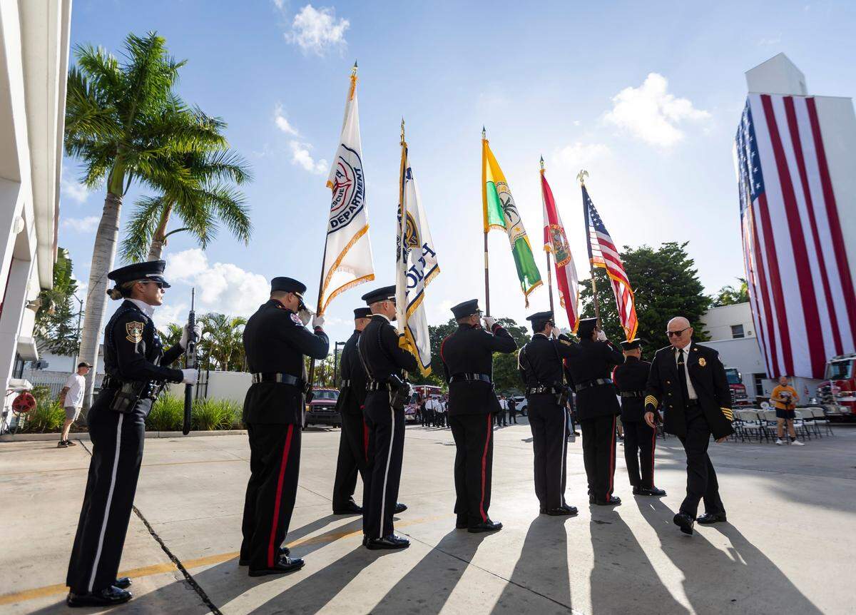 The Miami Beach Fire and Police Department honor guard attend a September 11, 2001, remembrance ceremony at Fire Station 2 on Monday, Sept. 11, 2023, in Miami Beach, Fla.