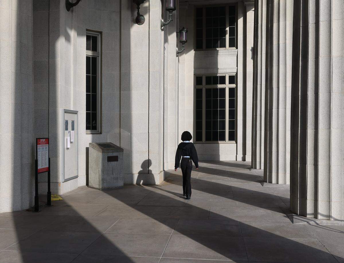 Large shadows are created by the setting sun on south entrance of the historic Dade County Courthouse on Wednesday, January 14, 2026, in Miami, Florida. The Dade County Courthouse is significant as an excellent example of Neo-Classical architecture. The detailing of the remaining historic interior spaces and features continue to reflect this distinctive style and contributes to a more complete understanding of the historic character of the Courthouse.