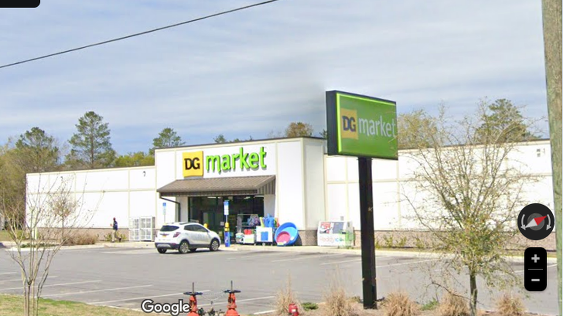 Deputy Will May was escorting a man out of this Dollar General store when a gunfight erupted, killing both men, Florida officials say.