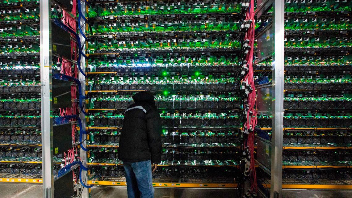 rest of original caption: Bitcoin is a cryptocurrency and worldwide payment system. It is the first decentralized digital currency, as the system works based on the blockchain technology without a central bank or single administrator. (Photo by Lars Hagberg / AFP) (Photo by LARS HAGBERG/AFP via Getty Images)