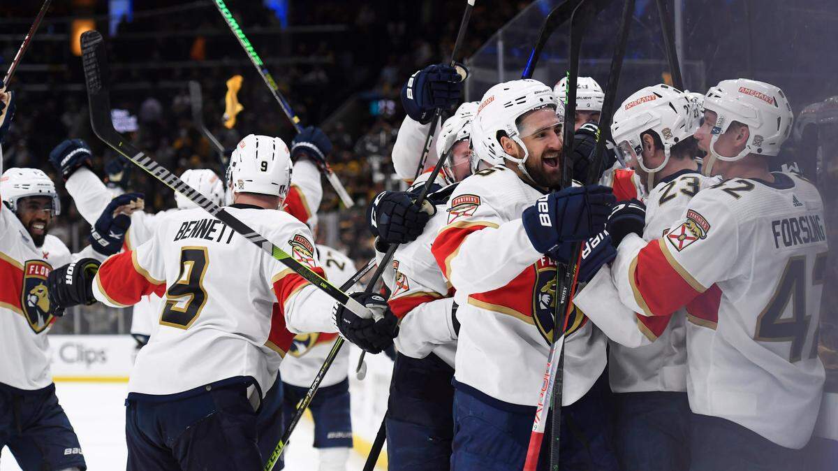 The Florida Panthers celebrate their overtime win over the Boston Bruins in game seven of the first round of the 2023 Stanley Cup Playoffs at TD Garden on Saturday, April 30, 2023.