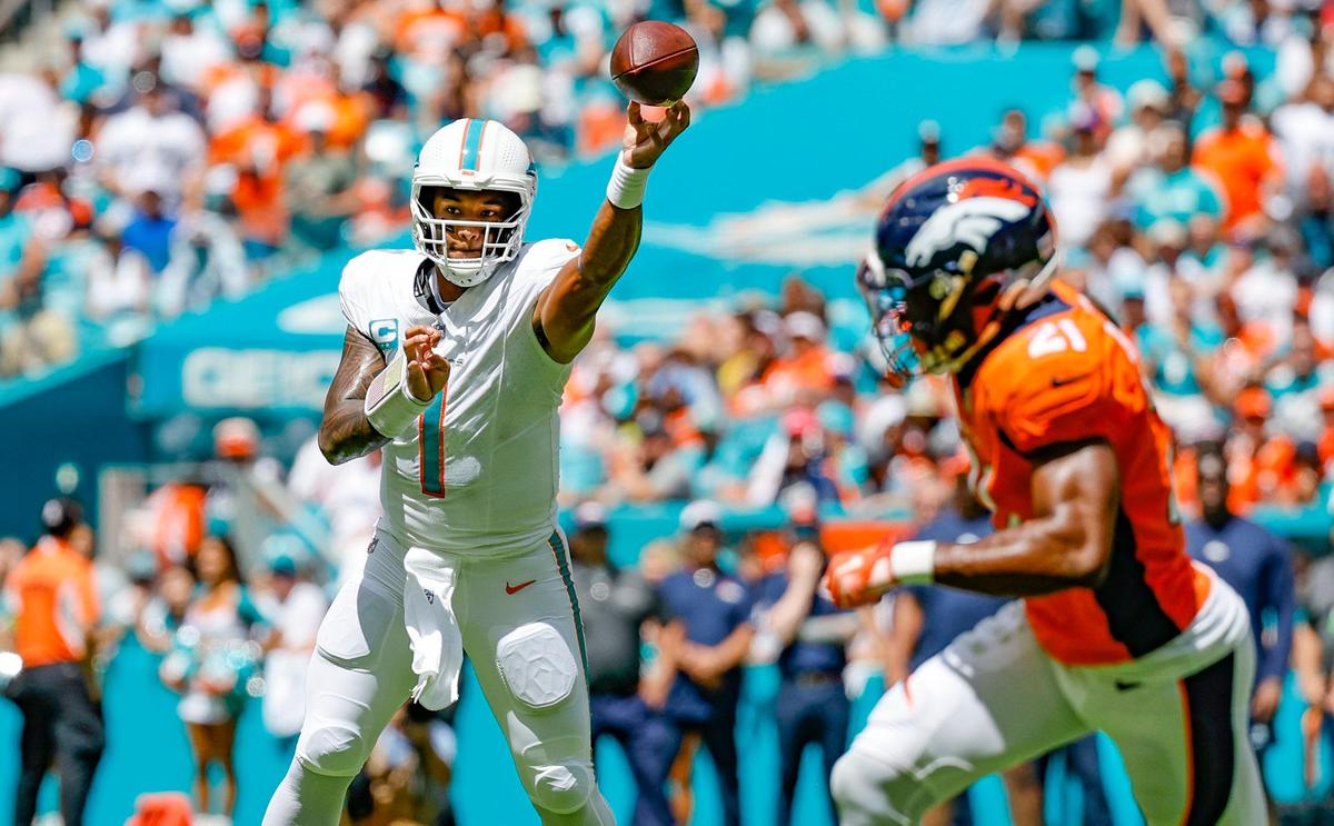 Miami Dolphins quarterback Tua Tagovailoa (1) passes the ball in the first half against the Denver Broncos at Hard Rock Stadium in Miami Gardens on Sunday, September 24, 2023.