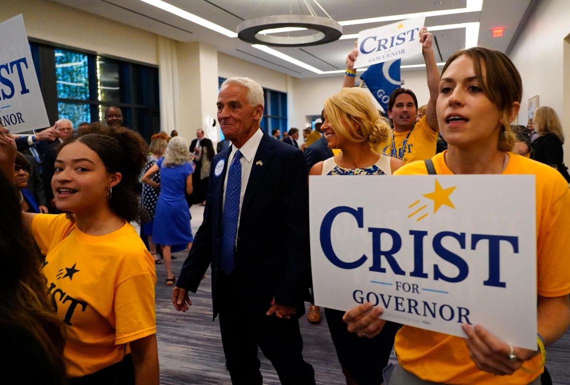 Charlie Crist arrives with his new Fiancé Chelsea Grimes before the start of the Leadership Blue Gala for the Florida Democratic Party on Saturday, July 16, 2022 in Tampa.