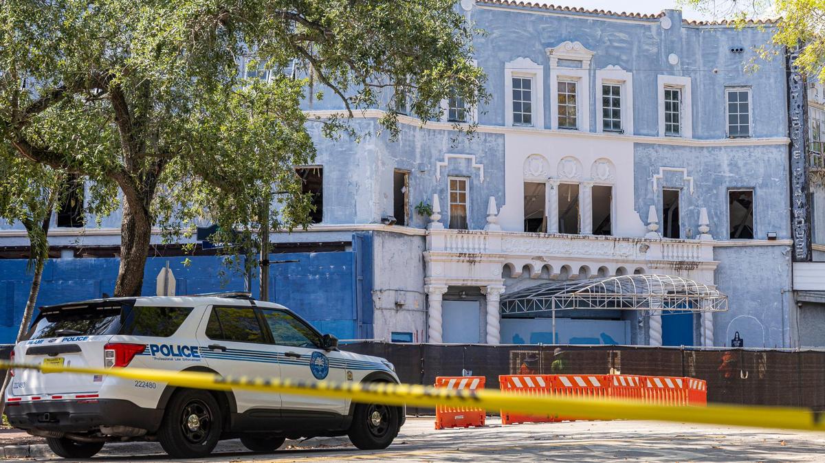 Streets around the Coconut Grove Playhouse were shut by police after a contractor’s error during demolition work inside the historic building left the roof unstable and the front wall at risk of collapse. The building has been stabilized and streets reopened, but demolition work remains stopped.