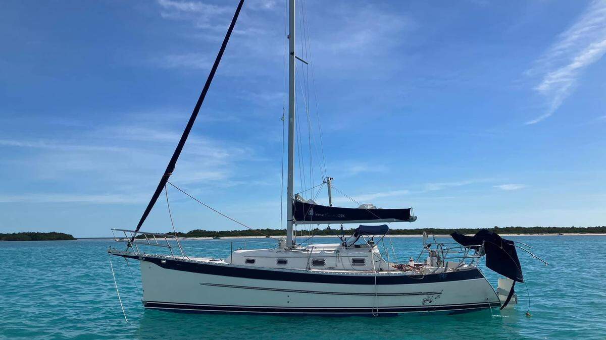 The sailboat Applesauce is anchored at sea off the Florida Keys. The Florida Fish and Wildlife Conservation Commission and the Coast Guard said it was hit by a commercial fishing vessel Friday, Jan. 20, 2023, and the operator of that boat left the scene.
