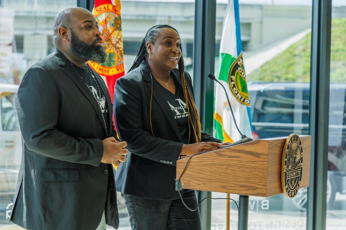 Marc and Dewana McDuffie speak during a ceremony where a marker was erected at the corner of 38 Street and N. Miami Avenue, to memorialize their father Arthur McDuffie, a 33-year-old insurance agent and former Marine, who was beaten into a coma by up to a dozen white Dade County police officers on Dec. 17, 1979, after he ran a red light on his motorcycle. on Saturday, February 24, 2024.