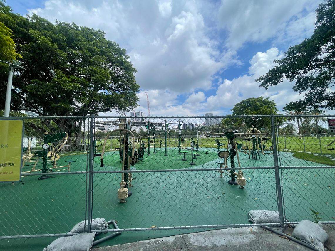 The fenced-in outdoor gym equipment at Maurice A. Ferré Park, on Thursday, August 8, 2024. Miami voters will decide if the equipment should stay in the park in a referendum.