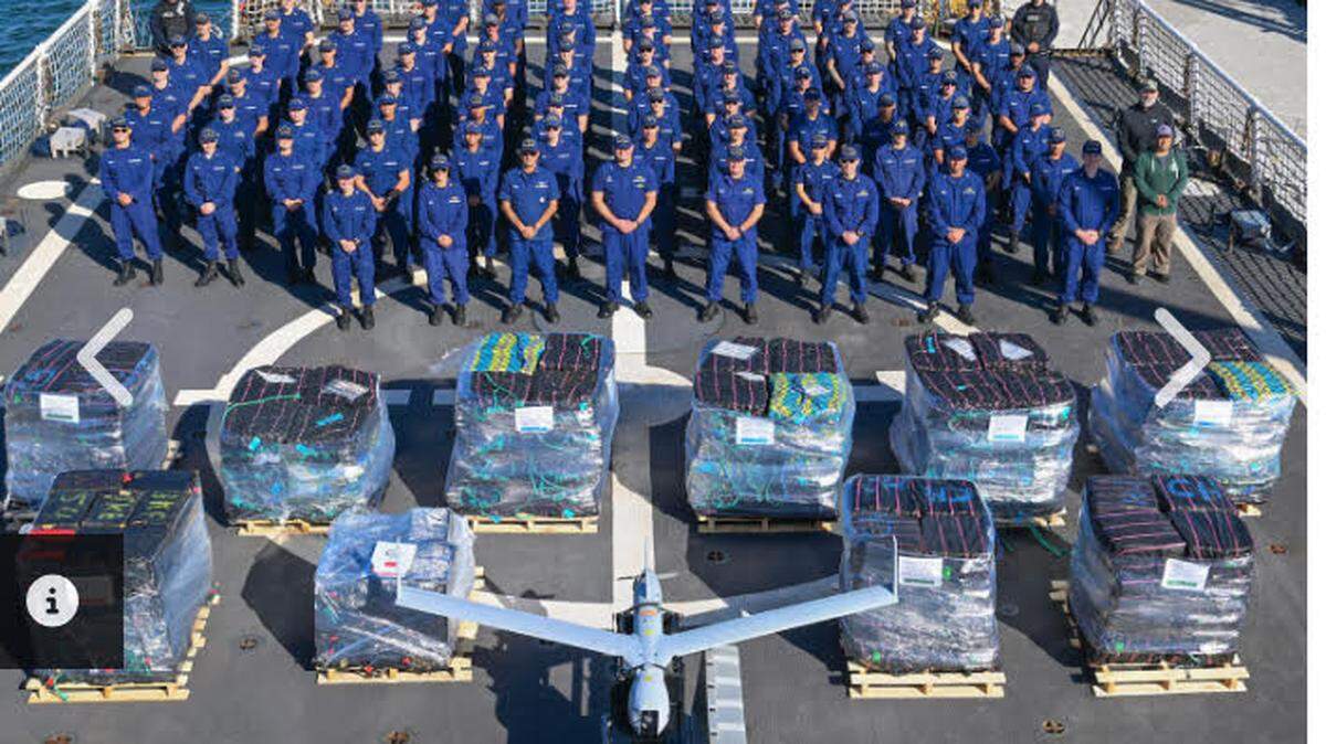 The crew of the U.S. Coast Guard Cutter Hamilton stand on the deck of the ship with more than 16,100 pounds of cocaine Monday, Dec. 2, 2024, at Port Everglades in Fort Lauderdale. The drugs were confiscated during a patrol off Central and South America, according to the Coast Guard.