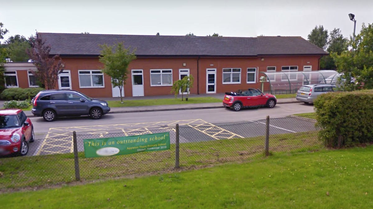 Police and officials in England have voiced concerns about a plan to put an open prison of convicted sex offenders just feet away from Appleton Thorn Primary School, shown above.