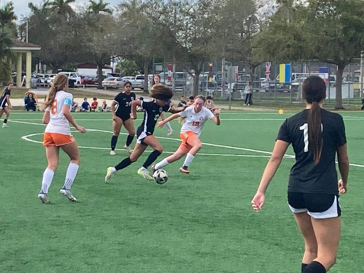 True North’s Reagan Elaine Hood dribbles the ball toward the goal during Wednesday’s Region 4-2A final at Kendall Soccer Park.