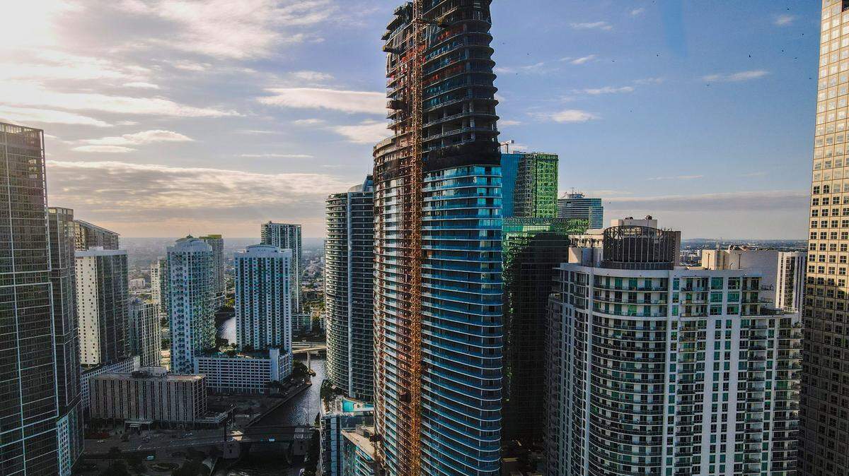 Aston Martin Residences, pictured above, topped off.