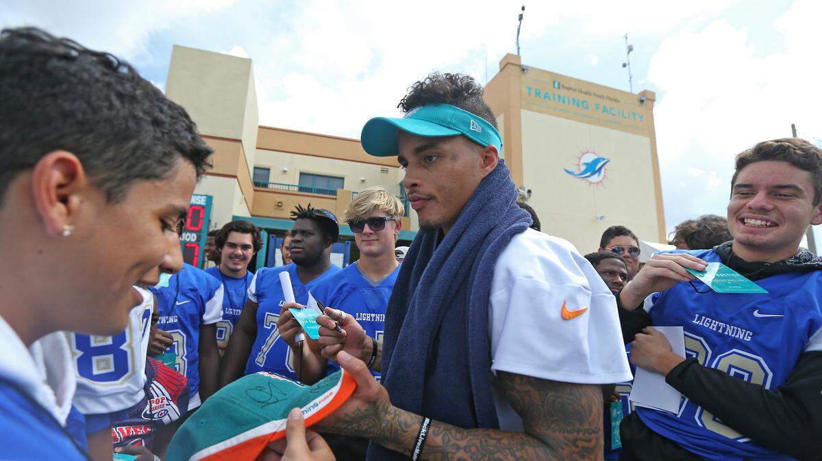 Dolphins receiver Kenny Stills signed autographs for fans most every day after training camp practices.