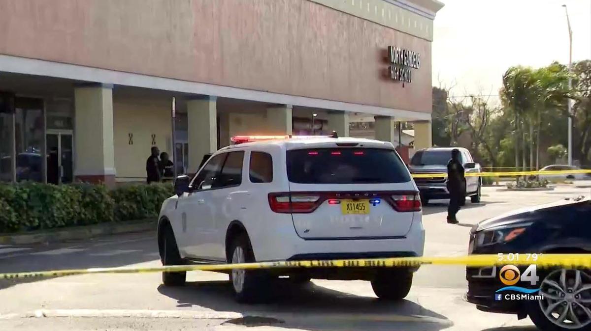 A drive-by shooting at North Gardens Senior High, a Miami Gardens charter school, on Wednesday, led to a police chase and gunfire before four people were taken into custody. Two people outside the school were injured.