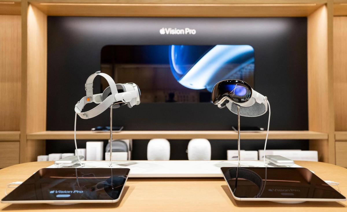 Vision Pros are on display inside the new Apple Miami Worldcenter store during a media preview on Wednesday, Jan. 22, 2025, in downtown Miami, Fla. Apple is set to open its newest store in downtown Miami on Friday, featuring a dedicated pickup area and a biophilic garden.