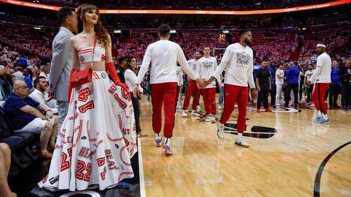 Radmila Lolly wore a gown at courtside for Miami Heat’s Game 6 of Eastern Conference finals at the Kaseya Center in Miami on Saturday, May 27, 2023.