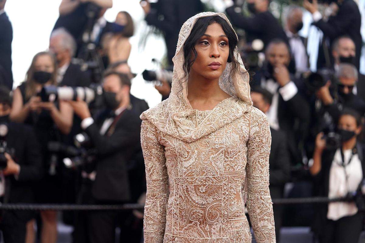 MJ Rodriguez poses for photographers upon arrival at the premiere of the film ‘Annette’ and the opening ceremony of the 74th international film festival, Cannes, southern France, Tuesday, July 6, 2021. (AP Photo/Brynn Anderson)