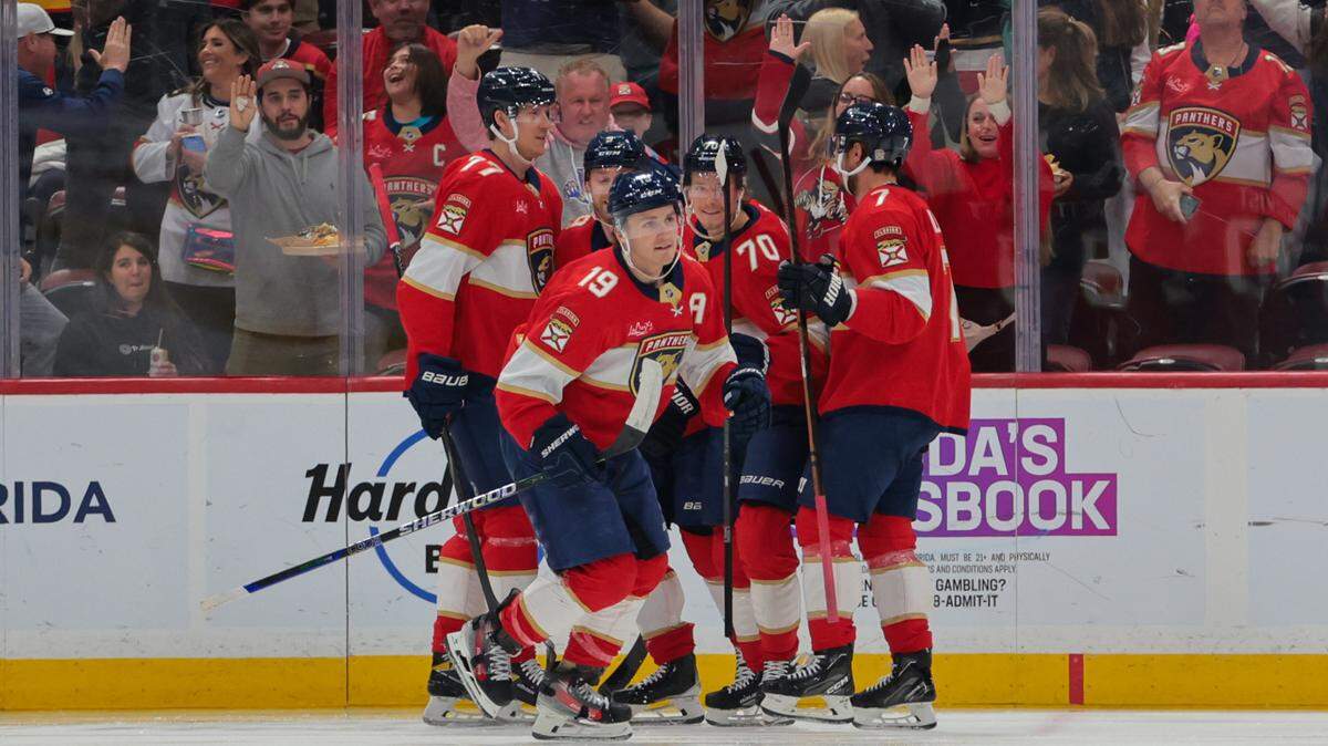 Dec 7, 2024; Sunrise, Florida, USA; Florida Panthers left wing Matthew Tkachuk (19) celebrates with teammates after scoring against the San Jose Sharks during the first period at Amerant Bank Arena.