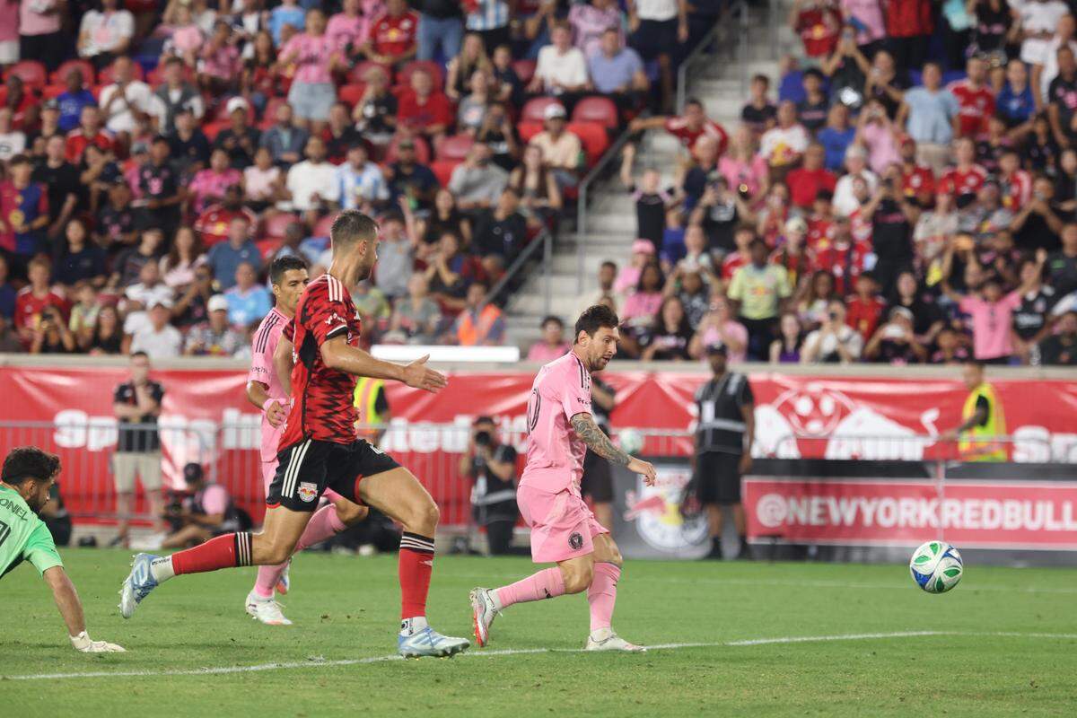 Jul 19, 2025; Harrison, New Jersey, USA; Inter Miami CF forward Lionel Messi (10) scores a goal during the second half against the New York Red Bulls at Sports Illustrated Stadium.