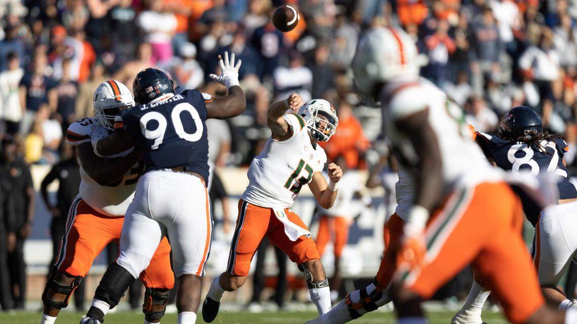Miami quarterback Jake Garcia throws a pass during an NCAA college football game against Virginia in Charlottesville, Va. on Saturday, Oct. 29, 2022.