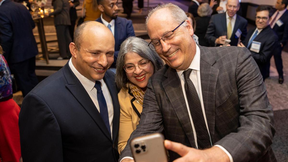 Naftali Bennett, who served as Israel’s 13th prime minister, left, takes a ‘selfie’ with Miami-Dade County Mayor Daniella Levine Cava and Miami Beach Mayor Dan Gelber before the start of the Greater Miami Jewish Federation’s The Main Event on Monday. More than 900 donors and guests attended the event, which marked the start of celebrations for the 75th anniversary of Israel, at the Loews Miami Beach Hotel at 1601 Collins Ave. The Main Event is also the largest single fundraising event organized by the nonprofit.