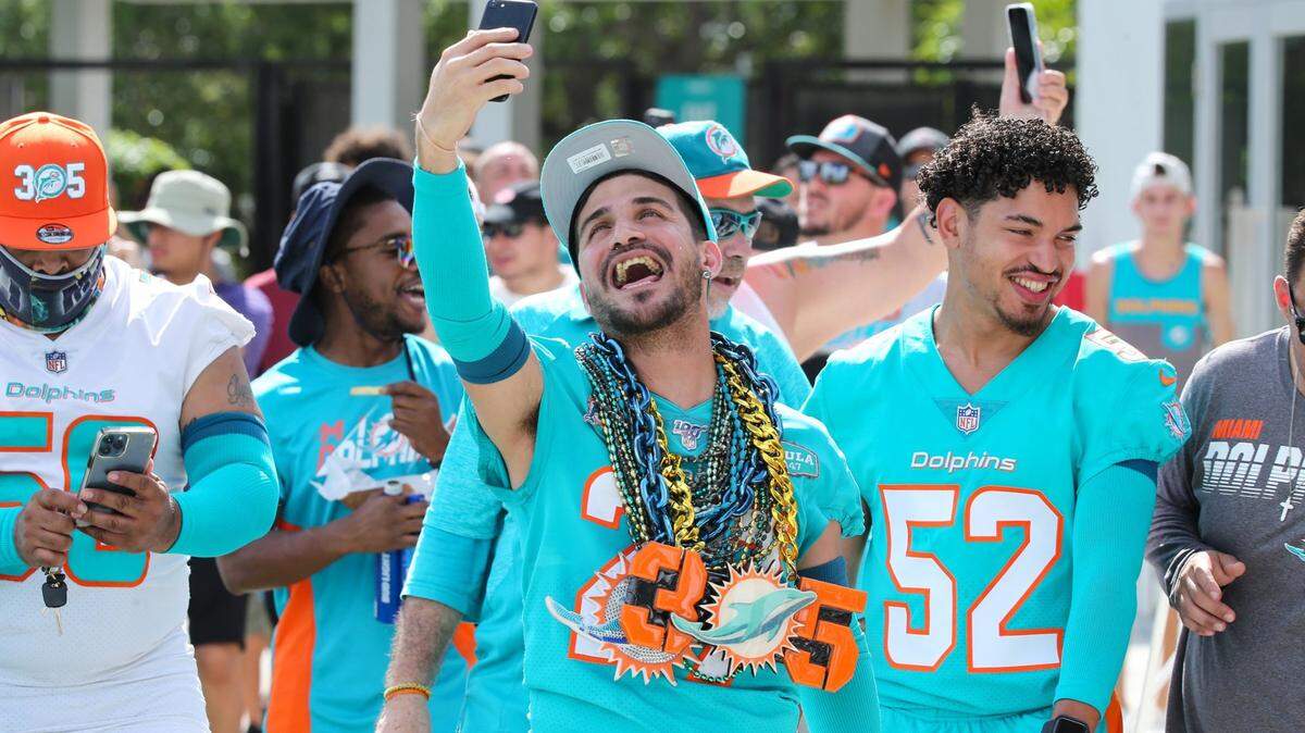 Miami Dolphins fan Brandon Martinez arrives for practice at Baptist Health Training Complex in Miami Gardens on Saturday, July 30, 2022.