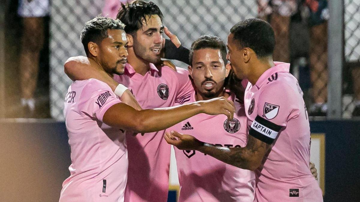 Inter Miami forward Leonardo Campana (9) celebrates alongside Ariel Lassiter (11), Jean Mota (7) and Gregore Silva (26) after scoring a goal against Miami FC during the second half of their U.S. Open Cup soccer match at FIU Stadium on Tuesday, April 19, 2022, in Miami, Florida.