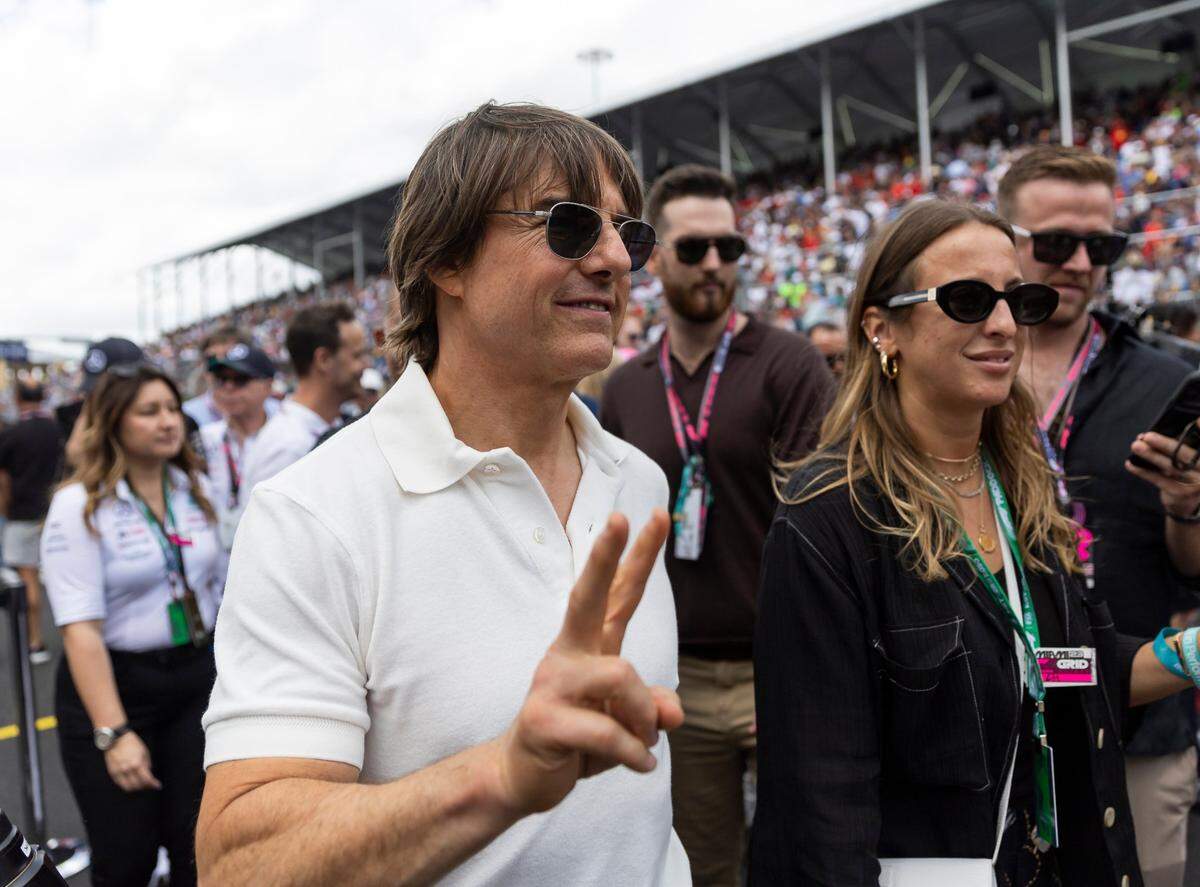 American actor Tom Cruise walks along the grid before the start of the Formula One Miami Grand Prix at the Miami International Autodrome on Sunday, May 7, 2023, in Miami Gardens, Fla.