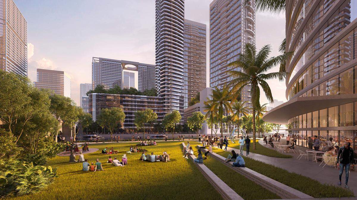 This rendering shows a proposed design for a revamped riverwalk, part of plans to redevelop the site of the Hyatt Regency downtown and the James L. Knight Center with three towers, one of them a supertall tower.