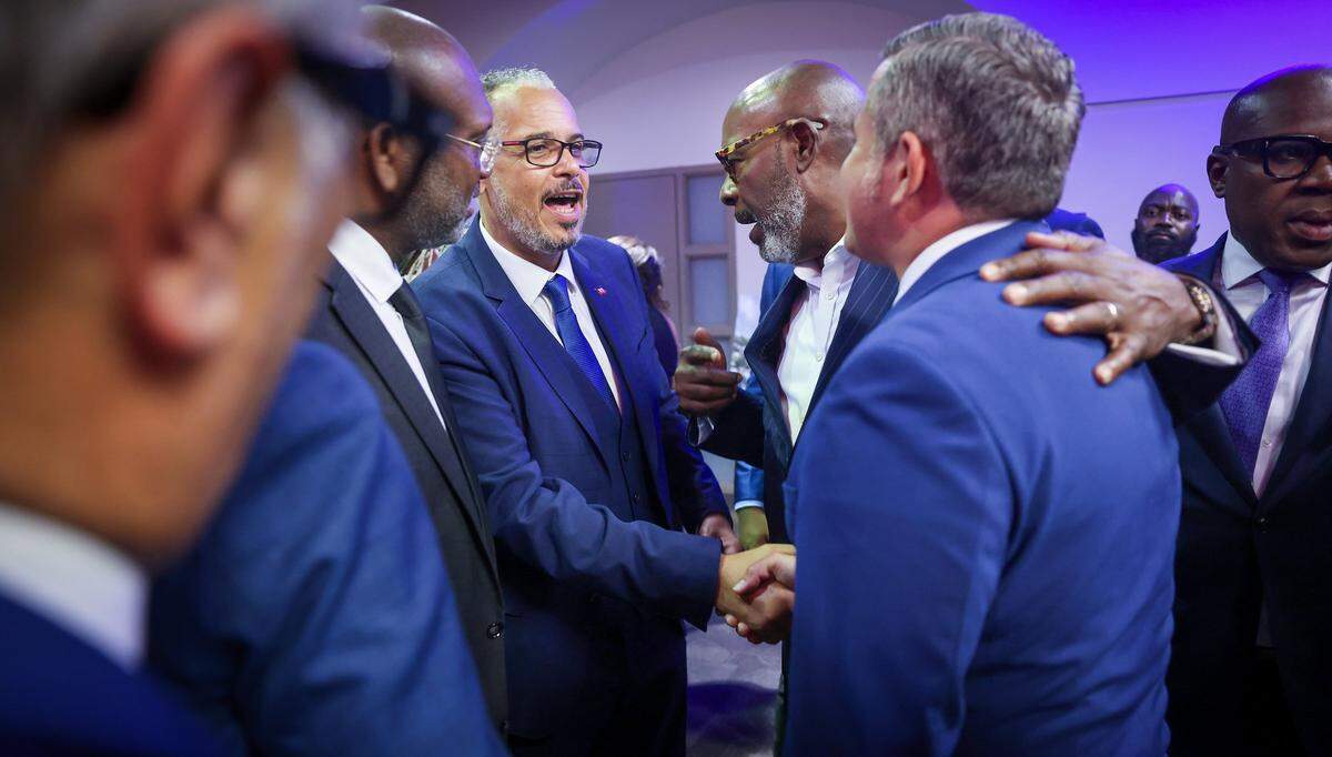 Haitian Prime Minister Alix Didier Fils-Aimé is greeted upon arrival at the official launch of the new Haitian Consulate in Miami at the Roz and Cal Kovens Center in North Miami, Florida, on May 6, 2026.