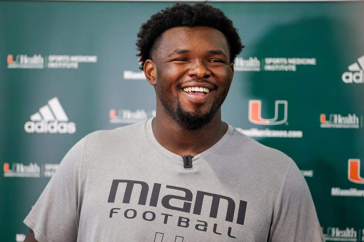 Miami Hurricanes offensive lineman Jalen Rivers (64) talks to reporters after spring practice at the University of Miami in Coral Gables, Florida, Saturday, March 4, 2023.