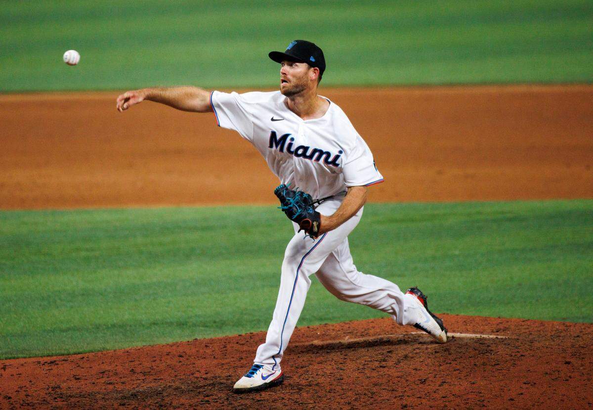 Miami Marlins pitcher Anthony Bender (55) pitches during the ninth inning of the season home opener baseball game against the Philadelphia Phillies at LoanDepot Park on Thursday, April 14, 2022 in Miami, Florida.